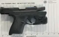 TSA officers stopped a man with this handgun at the Washington Dulles International Airport security checkpoint on April 20. (TSA photo)