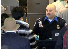 TSA Officer Gerardo Hernandez greets passengers at LAX. (TSA LAX photo)