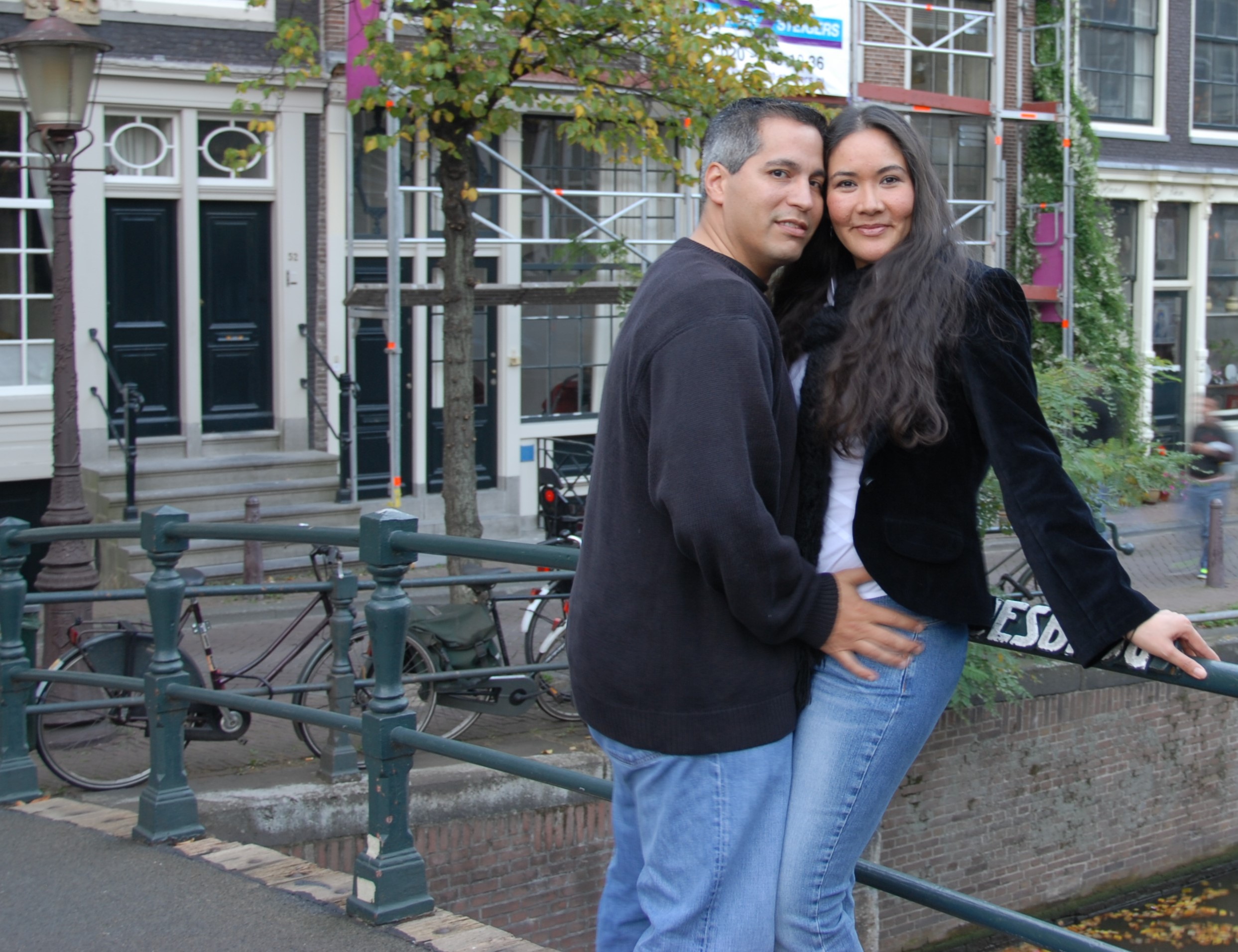 Amsterdam is the backdrop for this photo of the Melendezes. (Melendez photo)