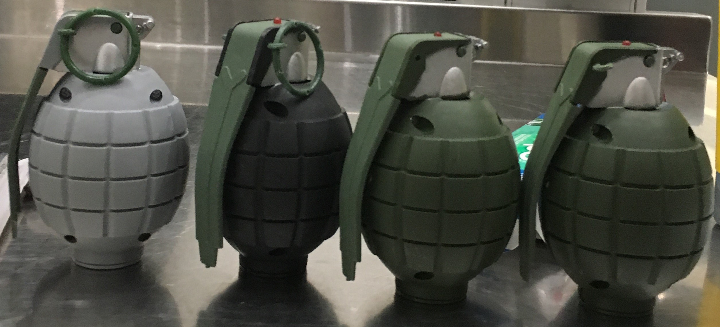 These 4 replica grenades were discovered in a carry-on bag at the Baltimore-Washington International Airport (BWI).