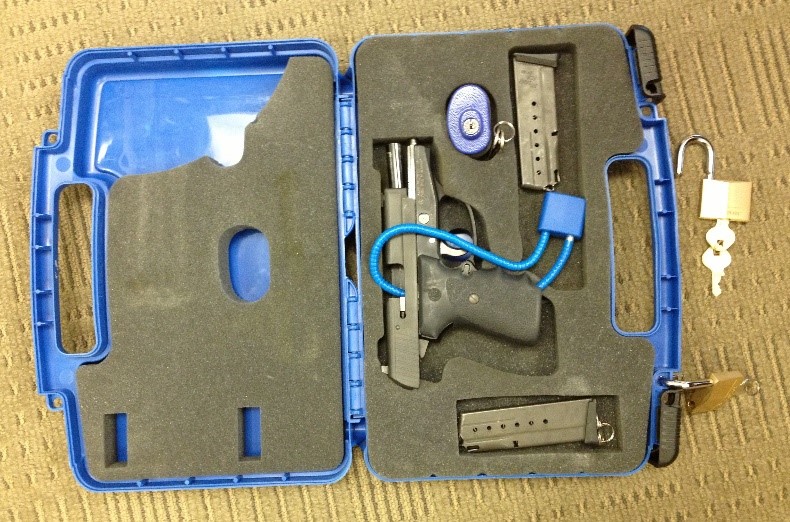 A properly packed firearm sits in a hard-sided case and is locked. This case must then be taken to the check-in counter for the airline to transport it in the belly of the plane. (TSA photo)