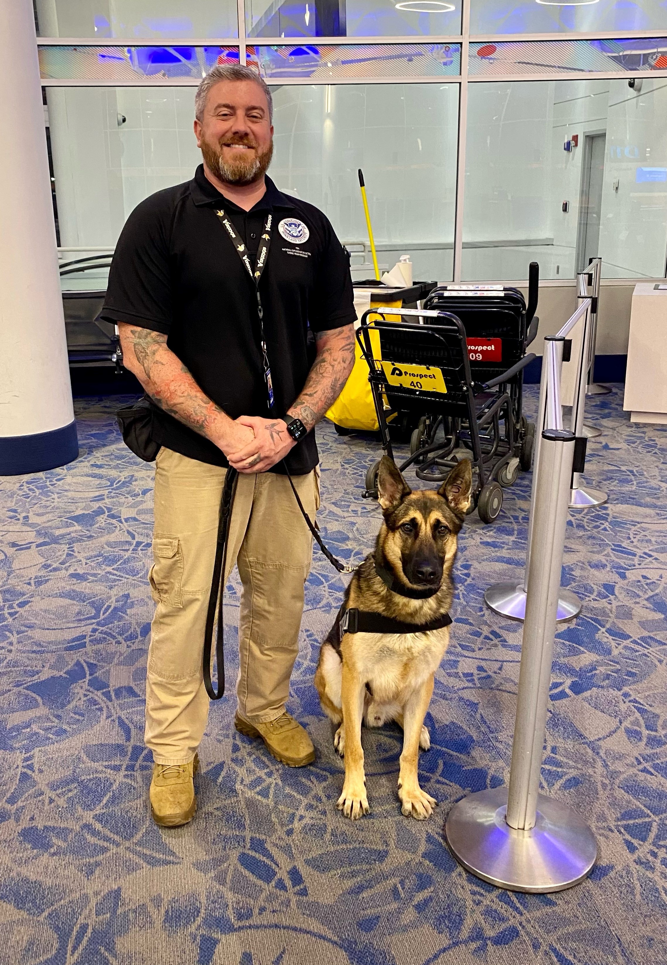 TSA canine handler Brandon Smith with Hary. (TSA photo)