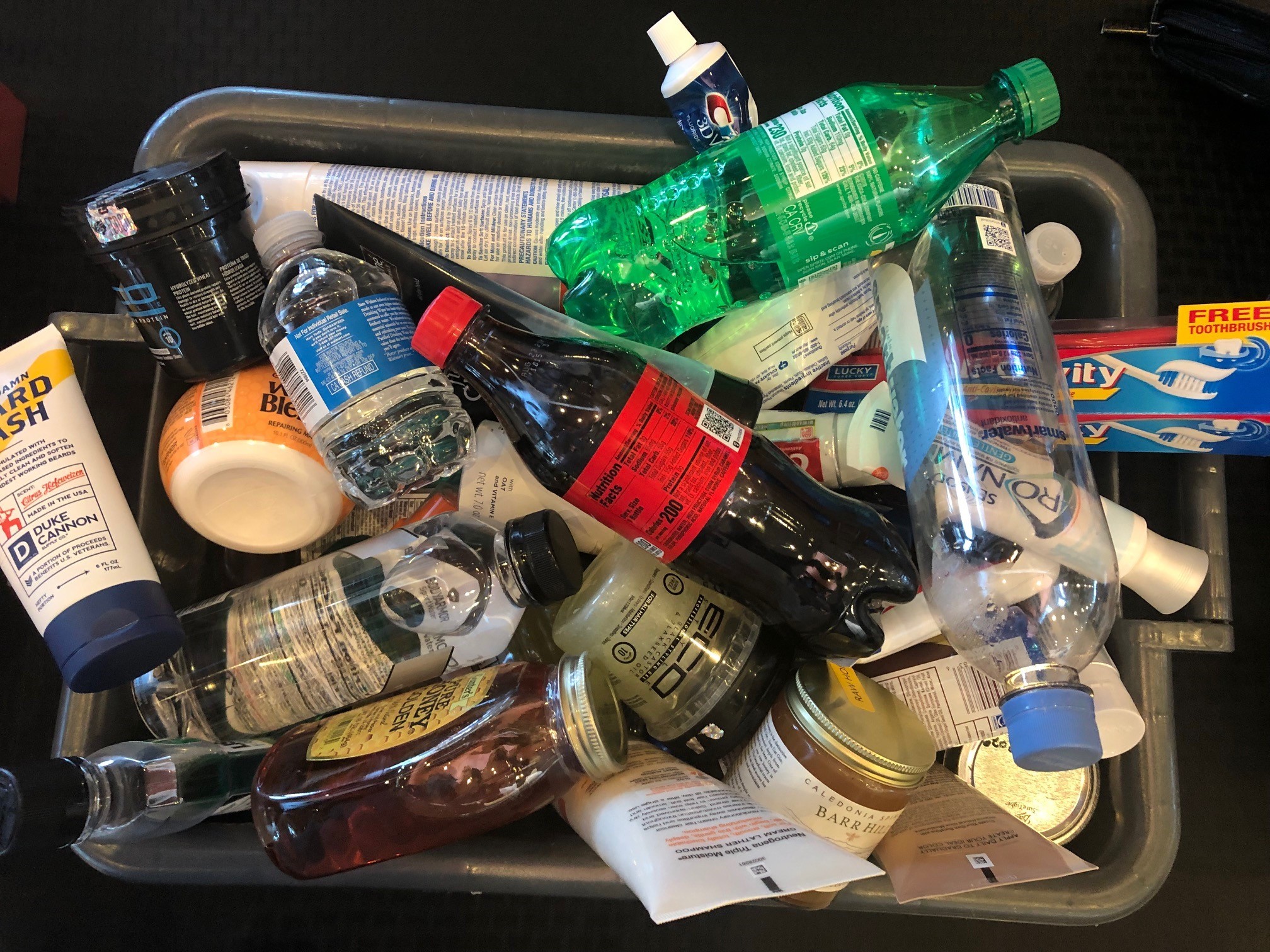 Travelers are not permitted to bring liquids, gels or aerosols larger than 3.4 ounces through a security checkpoint. The items pictured here have been surrendered by travelers at checkpoints. (TSA photo)