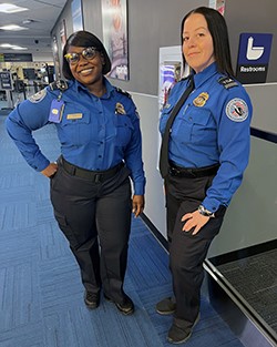 TSA Officers Sherelly Johnson, Carole McGonigle (LGA photo)