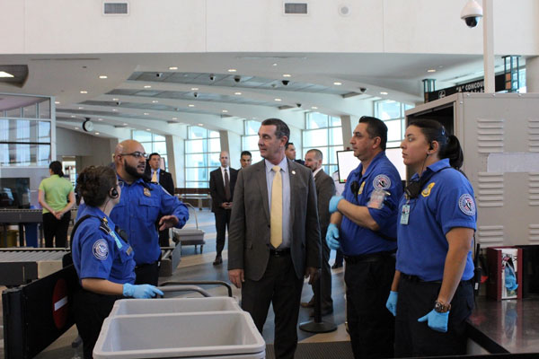 From left, Transportation Security Officer April Jenkins, Lead Transportation Security Officers Steven Madrid and Jesus Lopez, and Transportation Security Officer Sally Aguilar with Acting Deputy Secretary Pekoske