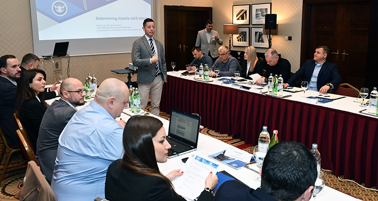 SFAM Michael Caskey leads UAS training session in Zagreb, Croatia. Transportation Security Specialist Gus Anderson stands in the back right. (U.S. Embassy, Zagreb photo)