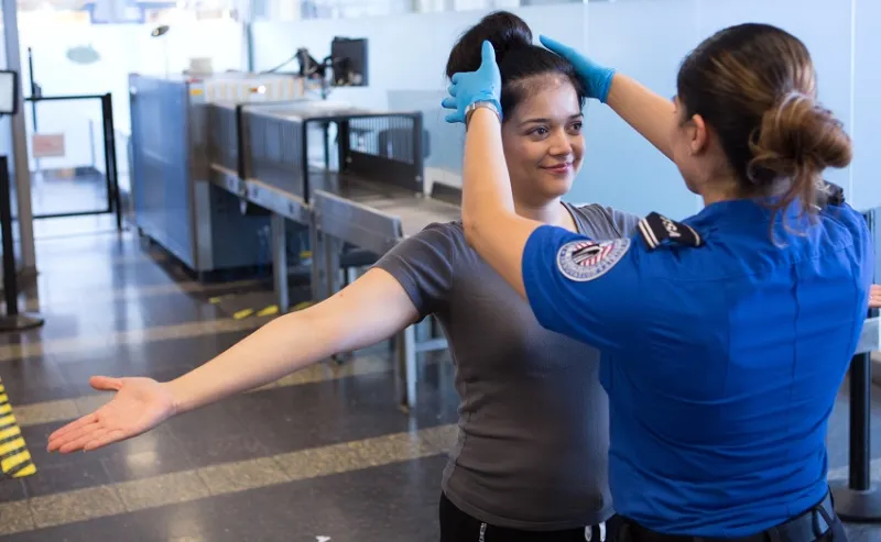 TSA Travel Tips: Hair Products and Pat-Downs - What to 