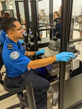 Chicago Midway International Airport TSA Officer Ramon Caballero working at the checkpoint. (Photo courtesy of Ramon Caballero)