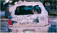 FAMS Special Agent in Charge Eric Sarandrea wrote “God Bless America” on this car near Ground Zero the day after the 9/11 attacks. (Eric Sarandrea photo)