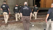 A TSA inspector joins VIPR team members outside McCormick Place near the Democratic National Convention in Chicago. (TSA photo) 