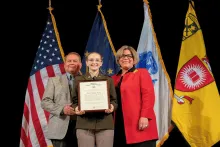2nd Lt. Olivia Garner with her parents, TSA Intelligence and Analysis Assistant Administrator Nancy Nykamp and Ken Garner, a commercial airline pilot. (Photo courtesy of Nancy Nykamp)