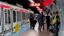 Passengers run out of train; NFTA police run in. (Luke Murphy photo)