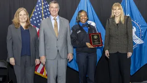 Supervisory TSA Officer Janaia Rhea accepts the CAT X-I Airport of the Year Award for IAH. Pictured with TSA Deputy Administrator Holly Canevari, Administrator David Pekoske and DHS Senior Official Performing the Duties of Deputy Secretary Kristie Canegallo. (Bruce Milton photo) 
