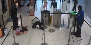 Indianapolis International Airport TSA Officer Jerald Washington contacted supervisors and assessed the threat risk. (CCTV screenshot)