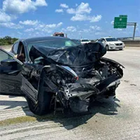 Photo of sedan in accident