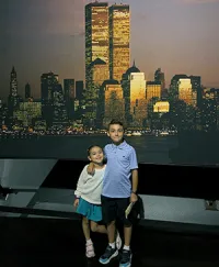 Benjamin and sister Florencia at the 9/11 Memorial. 