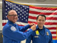 LTSO Cade Hammerschmidt and TSA Officer Chris Ly (Sue Niemann photo) 