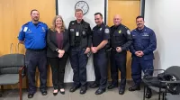 TSO Greg Deschenes with Deputy Administrator Holly Canevari and law enforcement partners at BDL. (Photo courtesy of Steve Blindbury)