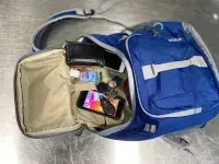 TSA recommends placing items from your pockets directly into a carry-on bag to save time in the checkpoint. (TSA photo)