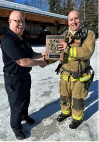 ​  Gene Kight with the 2023 North Star Volunteer Fire Department Firefighter of the Year Award.  ​