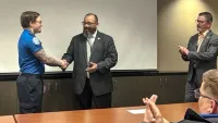 TSA Officer Savage and Deputy Assistant Federal Security Director-Screening Ignacio Luna (Airport photo)