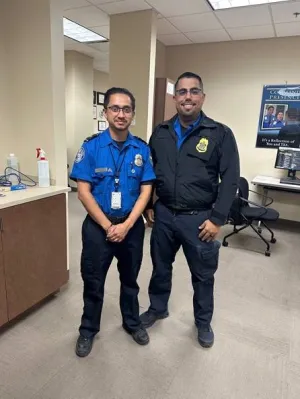 TSA Officer Ramon Caballero and colleague inside a TSA breakroom. (Photo courtesy of Ramon Caballero)