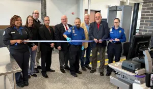 TSA, airport and Washington County, Md., officials cut a ribbon, recognizing a new credential authentication technology unit and a new computed tomography unit at the security checkpoint at Hagerstown Regional Airport.  (TSA photo)