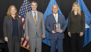 Kansas Federal Security Director Anthony Metcalf accepts the CAT II-IV Airport of the Year Award for ICT. Pictured with Deputy Administrator Holly Canevari, Administrator David Pekoske and DHS Senior Official Performing the Duties of Deputy Secretary Kristie Canegallo. (Bruce Milton photo)