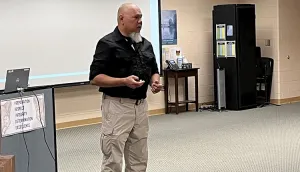 Indiana TSI Malcolm Duenas addresses the school transportation team at New Prairie Middle School. (Wendell Hart photo)