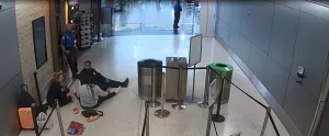 STSOs Milane Marolf and Walter Martin offered support as TSO Washington talked with the passenger. (CCTV screenshot)