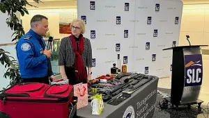 TSA Media Spokesperson Lorie Dankers and a TSA Officer at a media event in Salt Lake City. (TSA photo)
