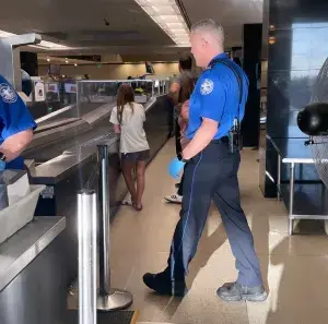 Seattle-Tacoma International Airport Supervisory TSA Officer John Rhoades supervises one of SEA’s checkpoints. (Photo courtesy of TSA SEA)