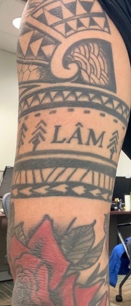 Tim Lam’s tattoo sleeve pays homage his parents. Lam in Vietnamese means trees or forest and his mom’s name is  Hoa which translates to Rose.  (Photo courtesy of Tim Lam)