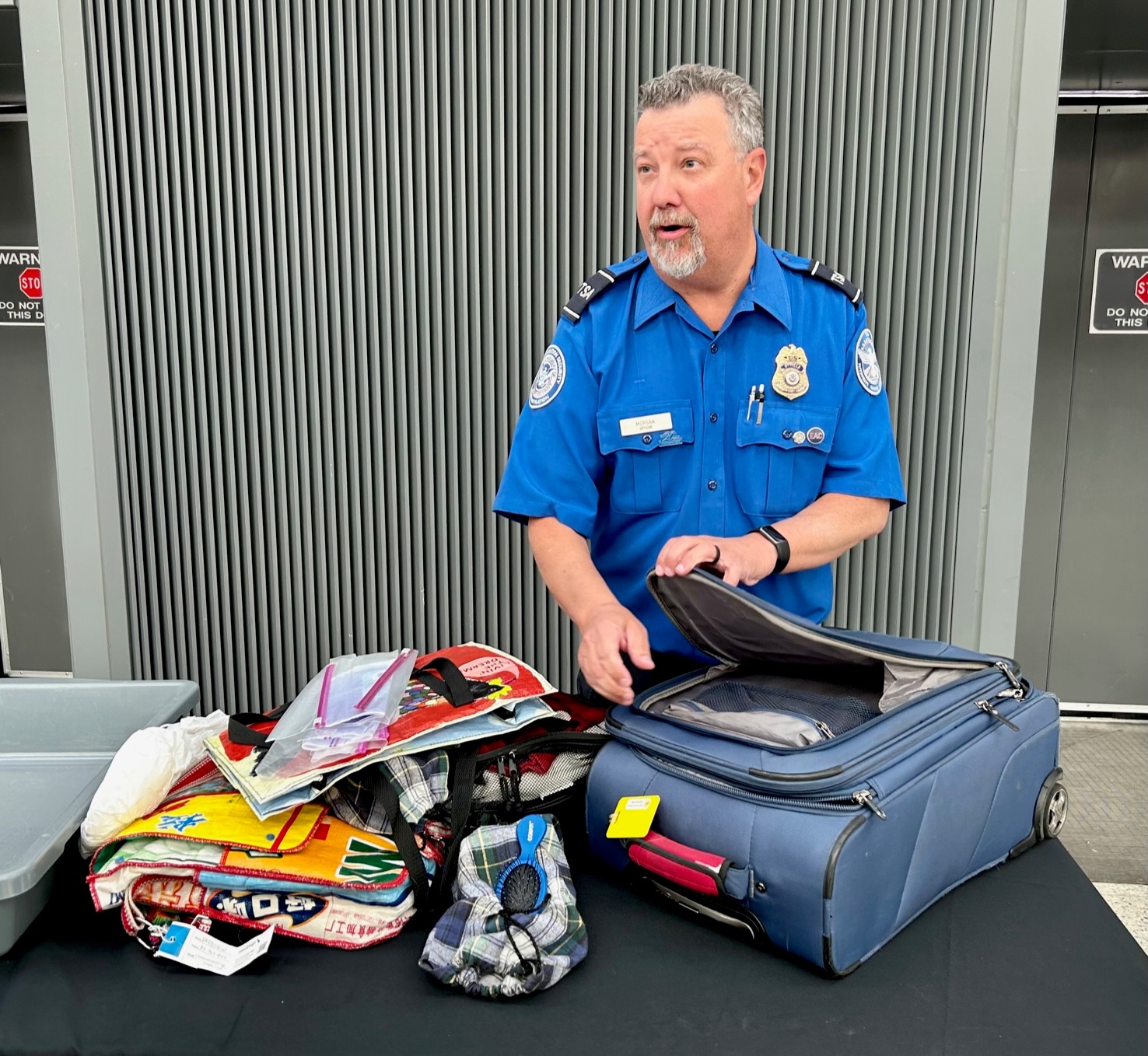 A TSA officer shares tips on how best to pack a carry-on bag. (TSA photo)